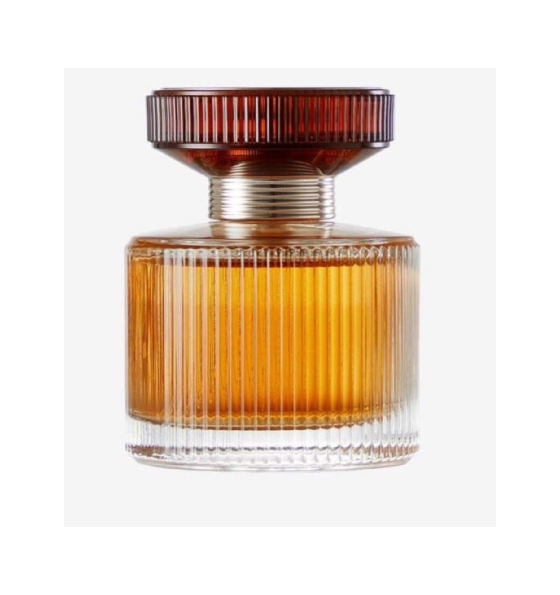 عطر زنانه آمبر الکسیر طلایی Amber Elixir